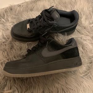 Black and grey Air Force 1s